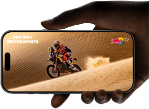 A hand holds an iPhone 17 Pro, Silver, horizontal, video playback on all-screen display demonstrating battery life